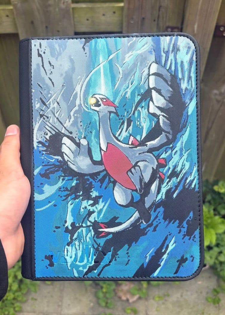 Custom Lugia-binder in stormachtige blauwtinten